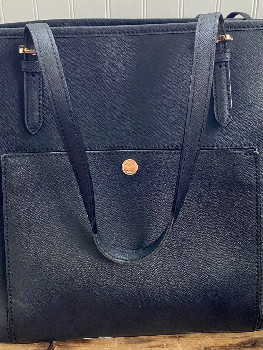 Michael Kors Black Bag with Straps and Inside Compartments.